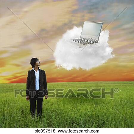 Kazakhstan businesswoman looking at laptop on cloud View Large Photo Image Stock Photo - Kazakhstan businesswoman looking at laptop on cloud. Fotosearch