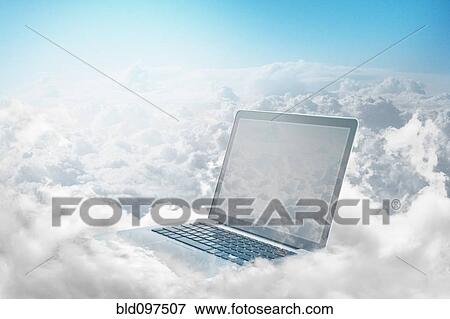 Laptop floating in clouds View Large Photo Image Stock Photo - Laptop floating in clouds. Fotosearch