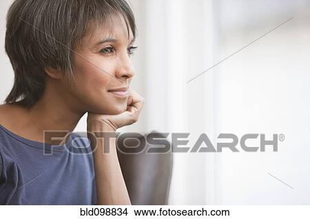 Picture - Native American woman thinking. Fotosearch