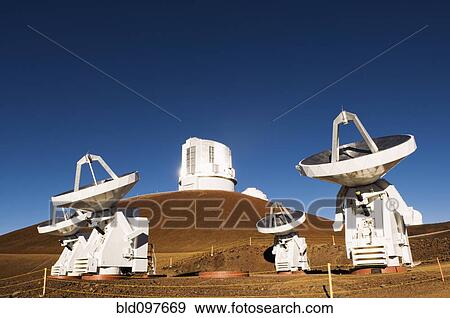 Stock Photo - Observatory and satellite dish on hillside. Fotosearch