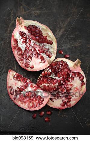 Stock Photo - Pomegranate broken open. Fotosearch