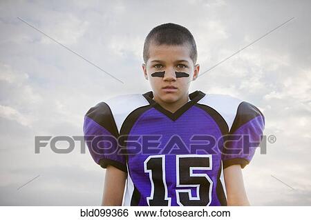 Serious mixed race football player View Large Photo Image Stock Photograph - Serious mixed race football player. Fotosearch