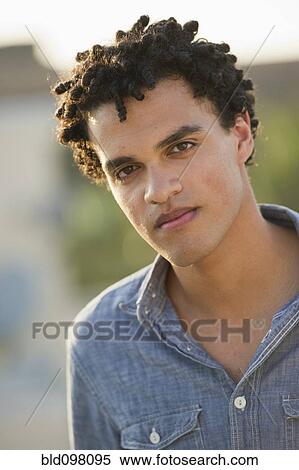 Serious mixed race man View Large Photo Image Stock Photography - Serious mixed race man. Fotosearch
