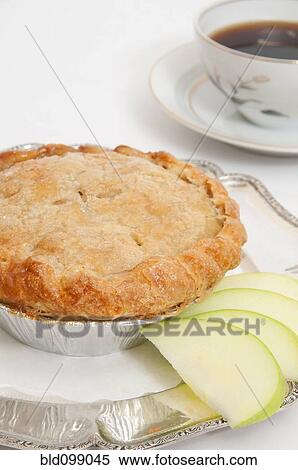Stock Photography - Small apple pie and cup of coffee. Fotosearch