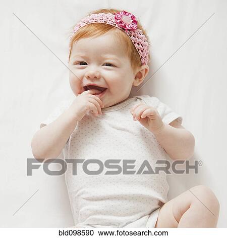 Smiling Caucasian baby girl View Large Photo Image Stock Image - Smiling Caucasian baby girl. Fotosearch