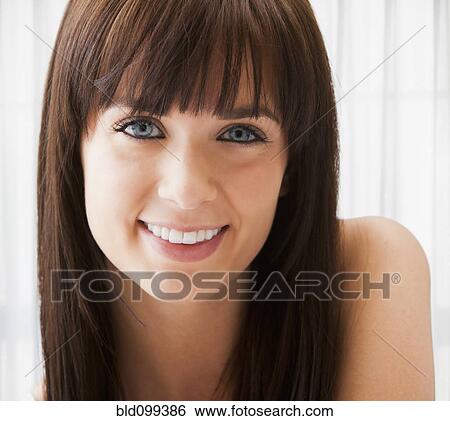 Stock Photograph - Smiling Caucasian woman. Fotosearch