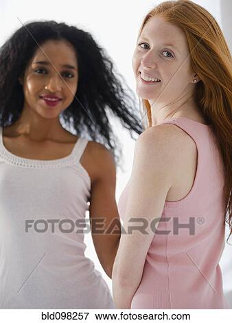 Stock Photo - Smiling friends. Fotosearch