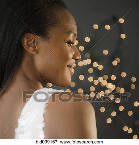 Stock Photo - Smiling, glamorous Black woman. Fotosearch