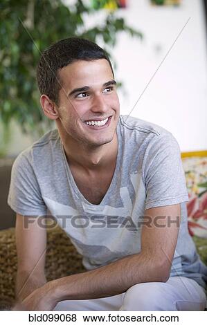 Stock Photo - Smiling Hispanic man. Fotosearch