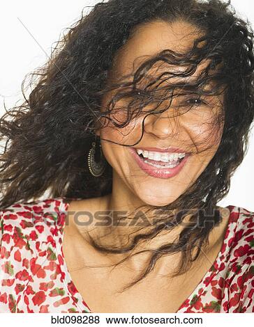 Stock Photo - Smiling Hispanic woman. Fotosearch