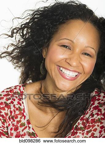Stock Photograph - Smiling Hispanic woman. Fotosearch