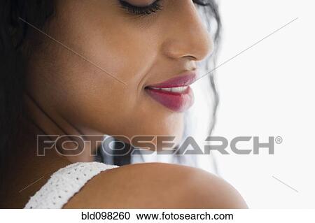 Stock Image - Smiling Middle Eastern woman. Fotosearch