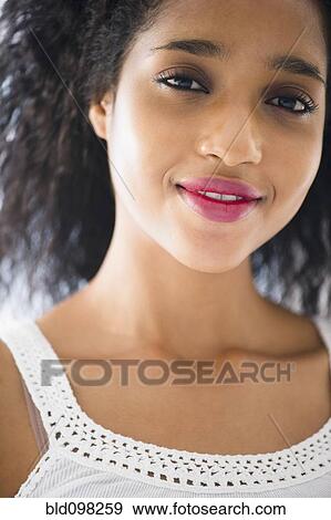 Stock Photo - Smiling Middle Eastern woman. Fotosearch
