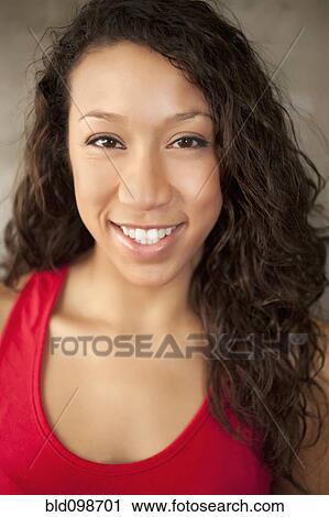 Stock Image - Smiling woman. Fotosearch