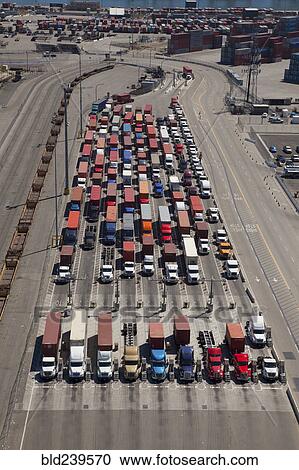 Aerial view of cargo containers on semi-trucks View Large Photo Image Stock Image - Aerial view of cargo containers on semi-trucks. Fotosearch