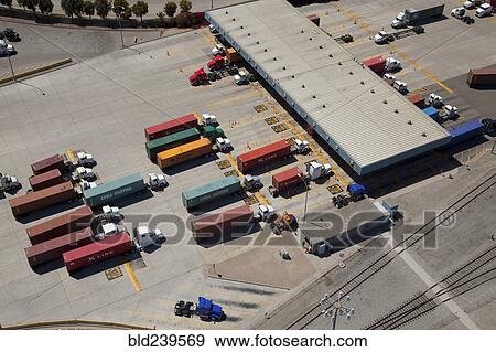 Aerial view of cargo containers on semi-trucks View Large Photo Image Stock Photo - Aerial view of cargo containers on semi-trucks. Fotosearch