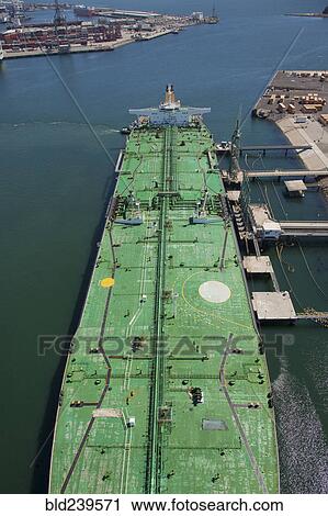 Aerial view of freighter at port View Large Photo Image Stock Image - Aerial view of freighter at port. Fotosearch