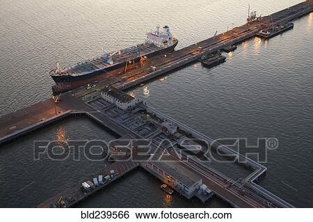 Stock Photograph - Aerial view of freighter at port. Fotosearch