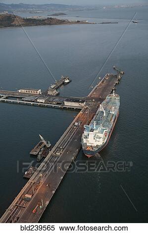 Aerial view of freighter at port View Large Photo Image Stock Photography - Aerial view of freighter at port. Fotosearch