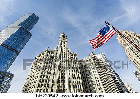 "American flag and highrise buildings, Chicago, Illinois, United States" View Large Photo Image Stock Image - "American flag and highrise buildings, Chicago, Illinois, United States". Fotosearch