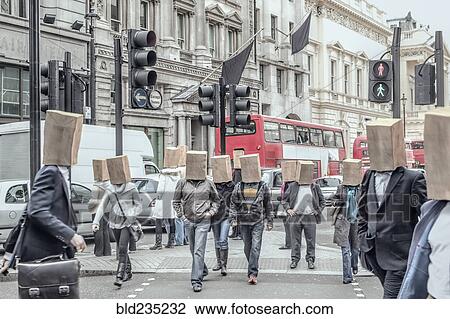 Anonymous people wearing paper bags on head in city View Large Photo Image Stock Image - Anonymous people wearing paper bags on head in city. Fotosearch
