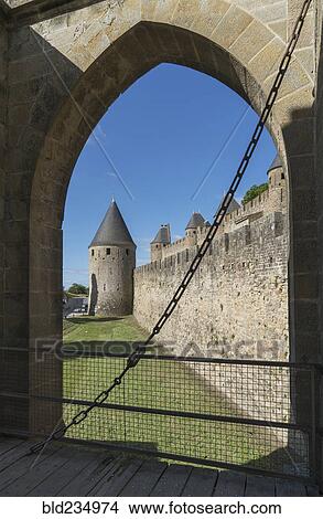 "Arch behind gate at castle in Carcassonne, Languedoc-Roussillon, France" View Large Photo Image Picture - "Arch behind gate at castle in Carcassonne, Languedoc-Roussillon, France". Fotosearch