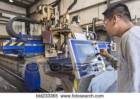 Asian worker using control panel in factory View Large Photo Image Stock Photography - Asian worker using control panel in factory. Fotosearch