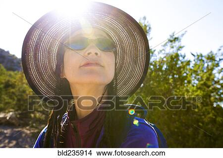 Back lit Japanese woman in sunny forest View Large Photo Image Picture - Back lit Japanese woman in sunny forest. Fotosearch