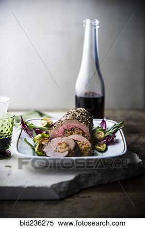 Beef tenderloin and red wine View Large Photo Image Stock Photography - Beef tenderloin and red wine. Fotosearch