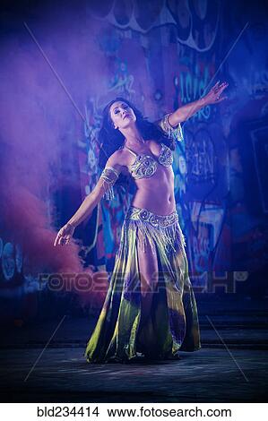 Picture - Belly dancer on stage. Fotosearch
