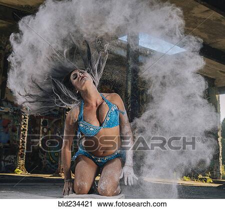 Belly dancer tossing hair with powder View Large Photo Image Stock Image - Belly dancer tossing hair with powder. Fotosearch