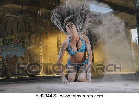 Belly dancer tossing hair with powder View Large Photo Image Stock Image - Belly dancer tossing hair with powder. Fotosearch