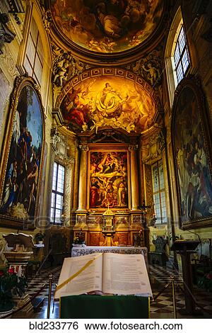 Stock Photograph - Bible on pedestal in ornate church. Fotosearch