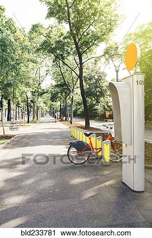 "Bicycle rental station in park, Vienna, Austria" View Large Photo Image Stock Image - "Bicycle rental station in park, Vienna, Austria". Fotosearch