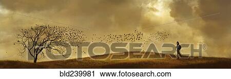 Birds flying from tree near Caucasian woman hiking View Large Photo Image Stock Image - Birds flying from tree near Caucasian woman hiking. Fotosearch
