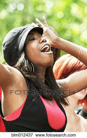 Stock Photo - Black woman dancing. Fotosearch