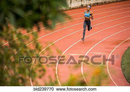 Black woman running on track View Large Photo Image Stock Image - Black woman running on track. Fotosearch