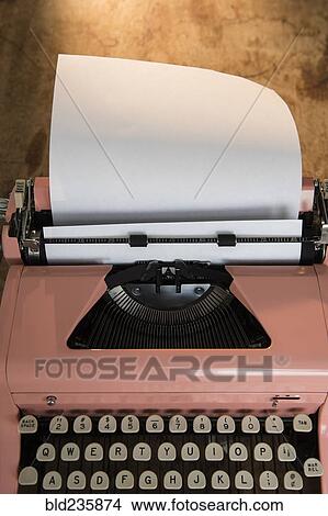 Picture - Blank paper in pink typewriter. Fotosearch