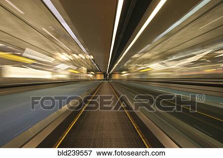 Blurred motion of moving walkway View Large Photo Image Stock Photo - Blurred motion of moving walkway. Fotosearch