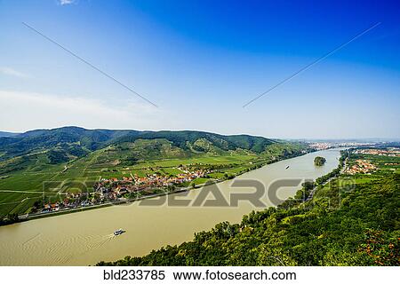 Boats on river near village View Large Photo Image Stock Photography - Boats on river near village. Fotosearch