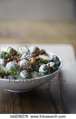 Bowl of brussels sprouts and cream View Large Photo Image Stock Photograph - Bowl of brussels sprouts and cream. Fotosearch