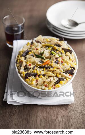 Bowl of Mexican tortilla casserole with corn View Large Photo Image Stock Photography - Bowl of Mexican tortilla casserole with corn. Fotosearch