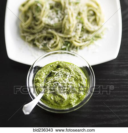 Stock Image - Bowl of parmesan pesto. Fotosearch