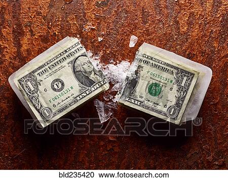 Broken dollar frozen in ice View Large Photo Image Stock Image - Broken dollar frozen in ice. Fotosearch
