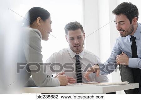 Business people meeting in office View Large Photo Image Stock Image - Business people meeting in office. Fotosearch