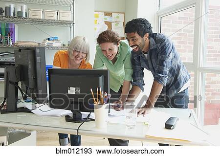 Business people working together in office View Large Photo Image Stock Image - Business people working together in office. Fotosearch