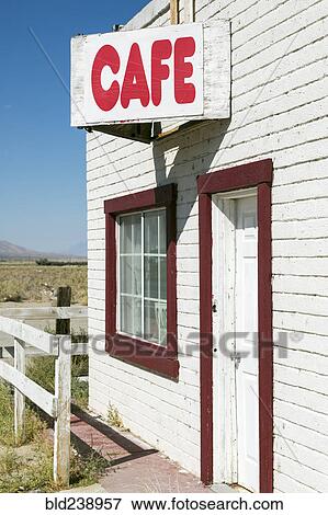 Cafe sign on abandoned building View Large Photo Image Stock Photo - Cafe sign on abandoned building. Fotosearch