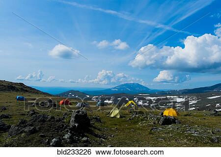 Camping tents in mountain landscape View Large Photo Image Stock Photograph - Camping tents in mountain landscape. Fotosearch