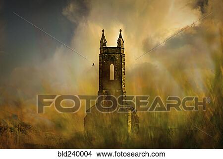 Picture - Castle tower behind grass. Fotosearch