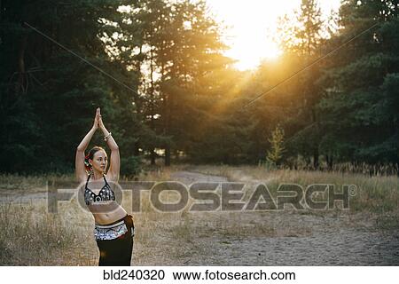 Caucasian belly dancer in field View Large Photo Image Stock Image - Caucasian belly dancer in field. Fotosearch